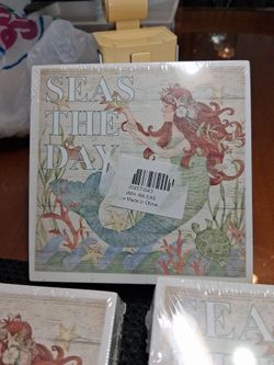 Mermaid wood frame. ($4 each)