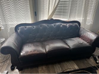 Leather sofa and love seat $300
