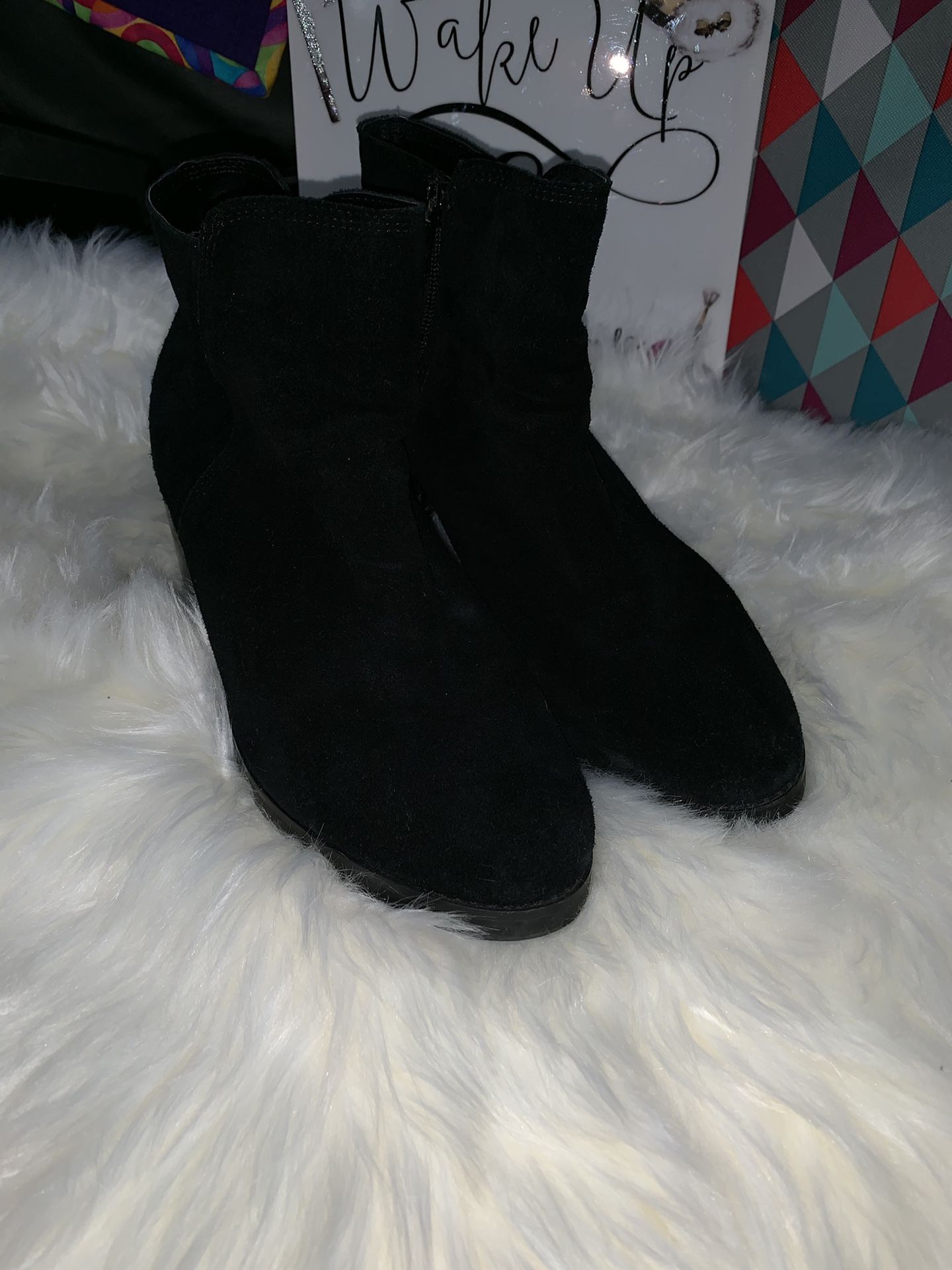 Black suede booties.