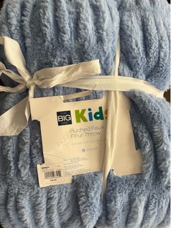New. Very soft, plush blanket. 50x60