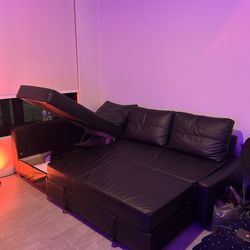 Couch: FRIHETEN Sleeper sectional, 3 seat w/storage, Bomstad black (Gently used)