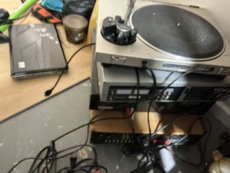 A few old DVDs player , and a album player (the nidle is damage