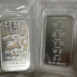 (2) one troy ounce .999 fine silver bars - Year of the Dragon 2012