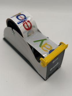 Tape Dispenser And Tape