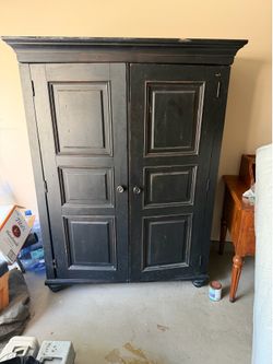 Ethan Allen secretary armoire black solid wood