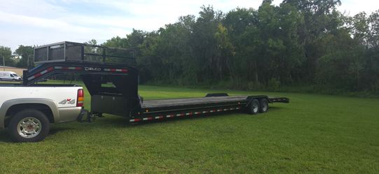 Gooseneck 2 trucm trailer w/drive over fender