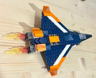LEGO Creator 3 in 1 Supersonic Jet Plane Toy Set, Transforms from Plane to Helicopter to Speed Boat Toy, Buildable Vehicle Models for Kids, Boys and G