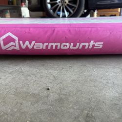 Inflatable tumbling mat