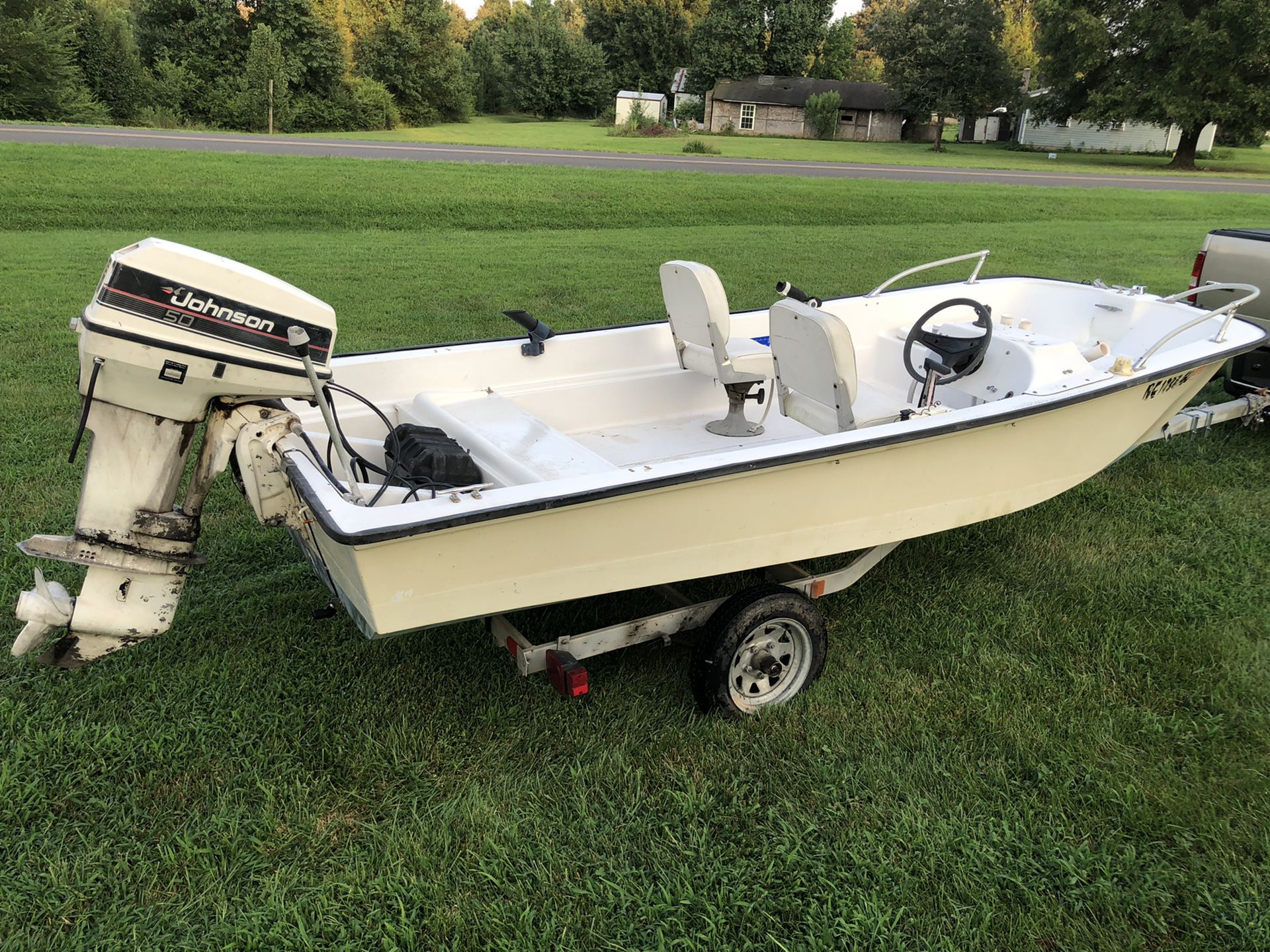 14’ mckee craft Johnson outboard galvanized trailer