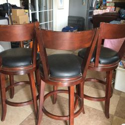 Set Of Three Swivel Bar Stools $75