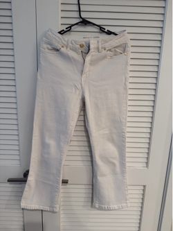 MICHAEL Michael Kors white cropped flare jeans.