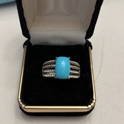 Sleeping Beauty turquoise set in a sterling silver ring.  