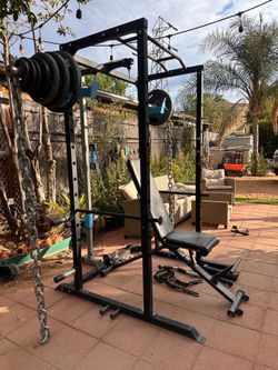 OLYMPIC SQUAT RACK WITH WEIGHTS AND BENCH