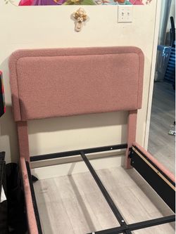 2 twin bed frames / used / pink and grey / 100$ for both