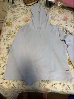 Woman’s large sweater