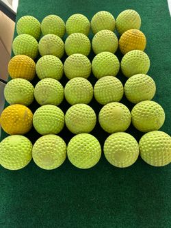 Softball pitching machine balls