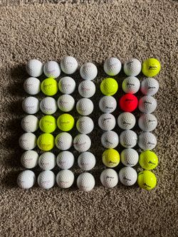 49 used Kirkland and Srixon Golf balls