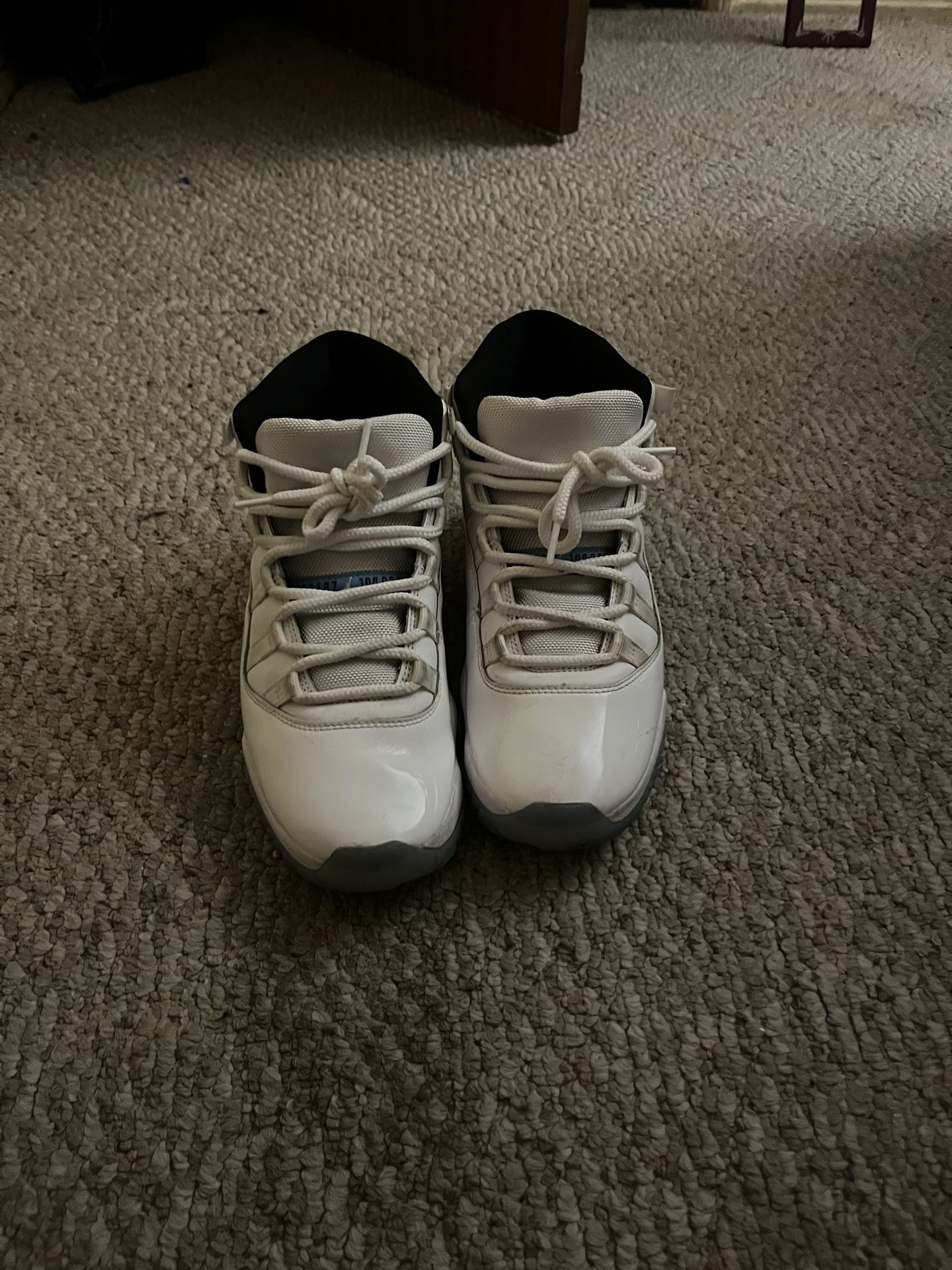 White Jordan 11’s