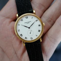 PATEK PHILIPPE YELLOW GOLD CALATRAVA REF. 3919J