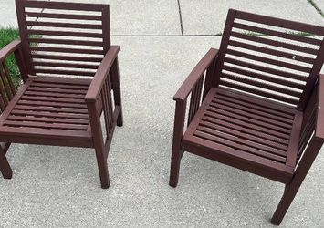 Two elegant patio chairs