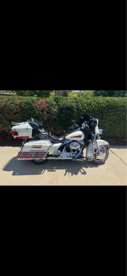 2000 Harley Davidson ultra classic its the shriner edition 88 cubic inch motor,5speed tranny,clean title current registration, 46,000 miles has all th