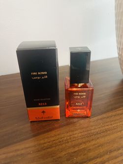 Fire Bomb Rouge Collection R213. The authentic woman perfume Arabian Oud Made in Saudi Arabia. 1.2oz