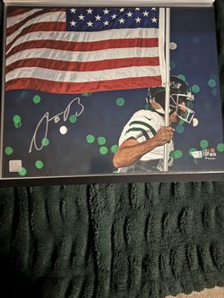 A. Rodgers Autographed Jets 16x20 Photo