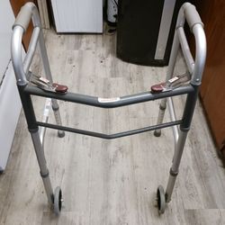 Assisted Walker With Rolling Wheels On Front Legs