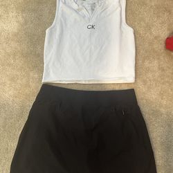 Like New Calvin Klein top and bottom the skirt has shorts under