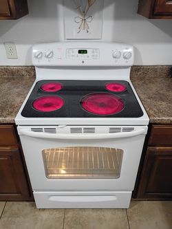 GE, White Electric Stove.
