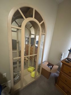 Arched glass cabinet