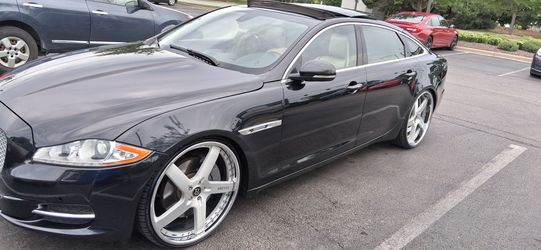 24 inch staggered Brutus wheels and tires