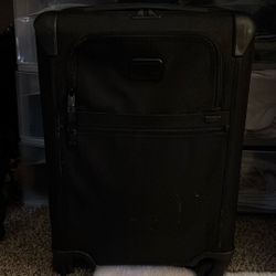 Barely Used TUMI suitcase