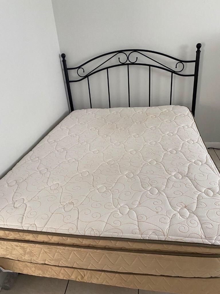 Full Size Beds, Like New, Boxspring and Mattress Are In mattress covers