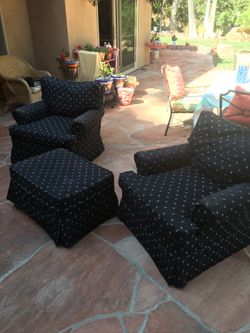 Slip covered chairs and ottoman