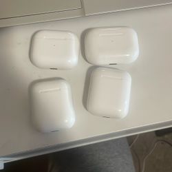 4 Different AirPods (three Are Empty With Just The Case And One Has An AirPod In It)