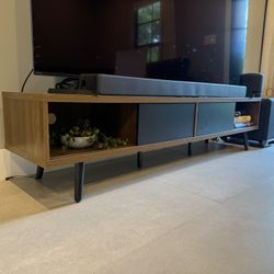 Mid-Century Walnut + Black Sliding-Door TV Stand (70″) – Excellent Condition