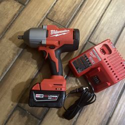 Milwaukee M18 1/2 High Torque Impact Wrench W/ One Battery 4.0 And Charger New 