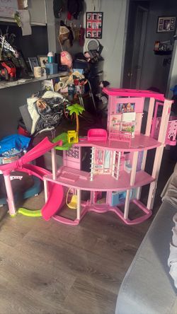 Large Barbie house with some accessories