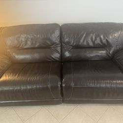 RECLINING LEATHER COUCH AND LOVE SEAT