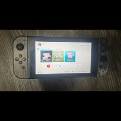 Nintendo Switch W/ Grand Theft Auto Game 