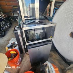 One Small One BIG MICROWAVE 