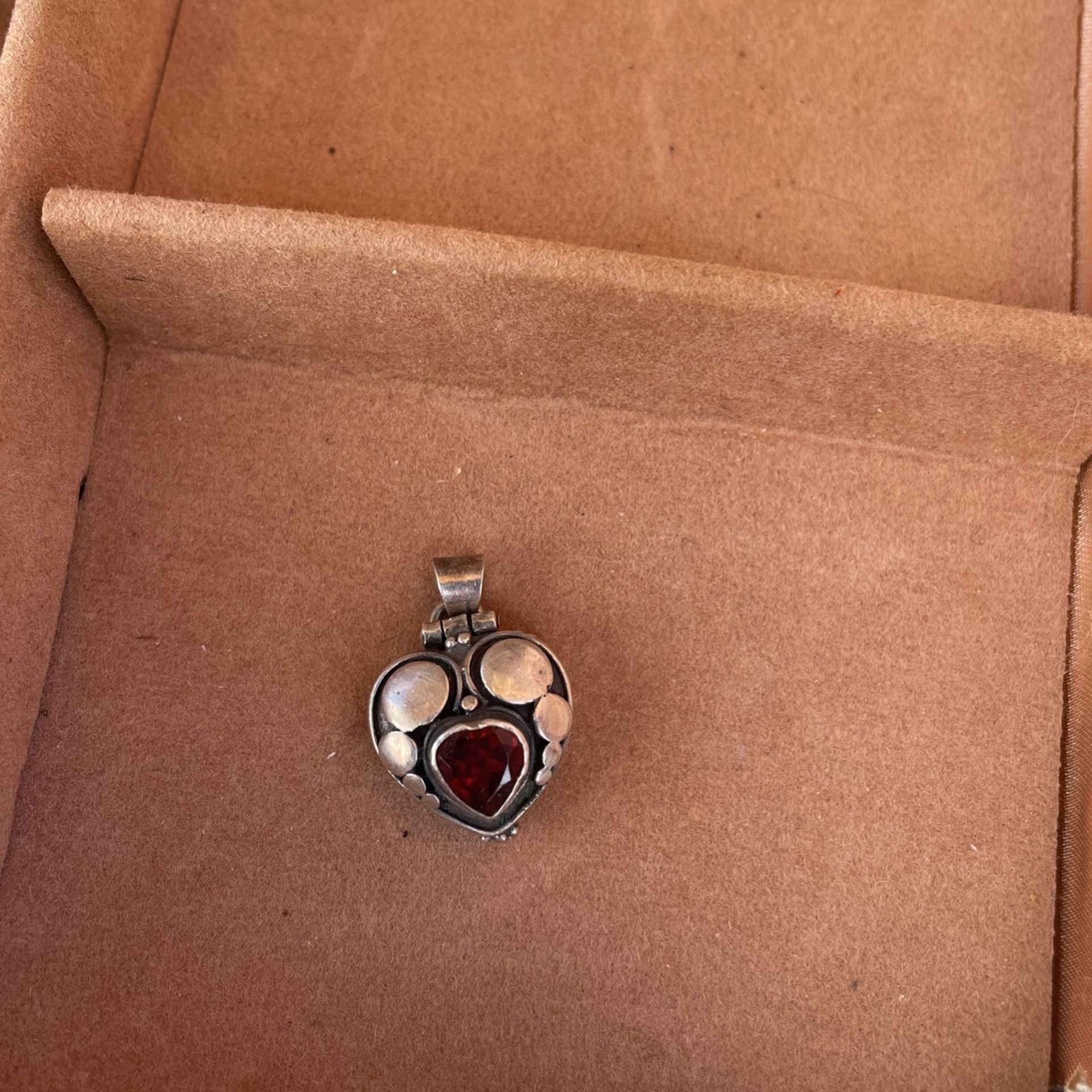 Sterling Silver And Garnet Locket 