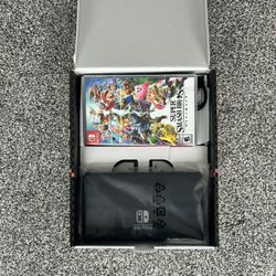 Nintendo Switch OLED + 2 games included