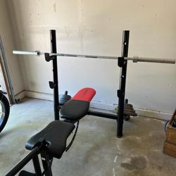 Weight Bench, Barbell, and Weight Plates
