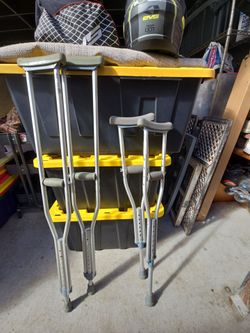 Two sets of crutches 1 set for adult and 1 set for kids