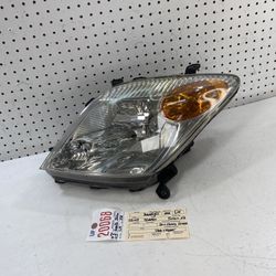 2002 2005 TOYOTA SCION XA LEFT SIDE HEADLIGHT LAMP OEM