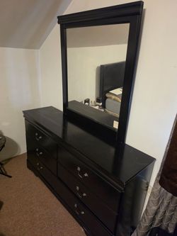 Black dresser with mirror