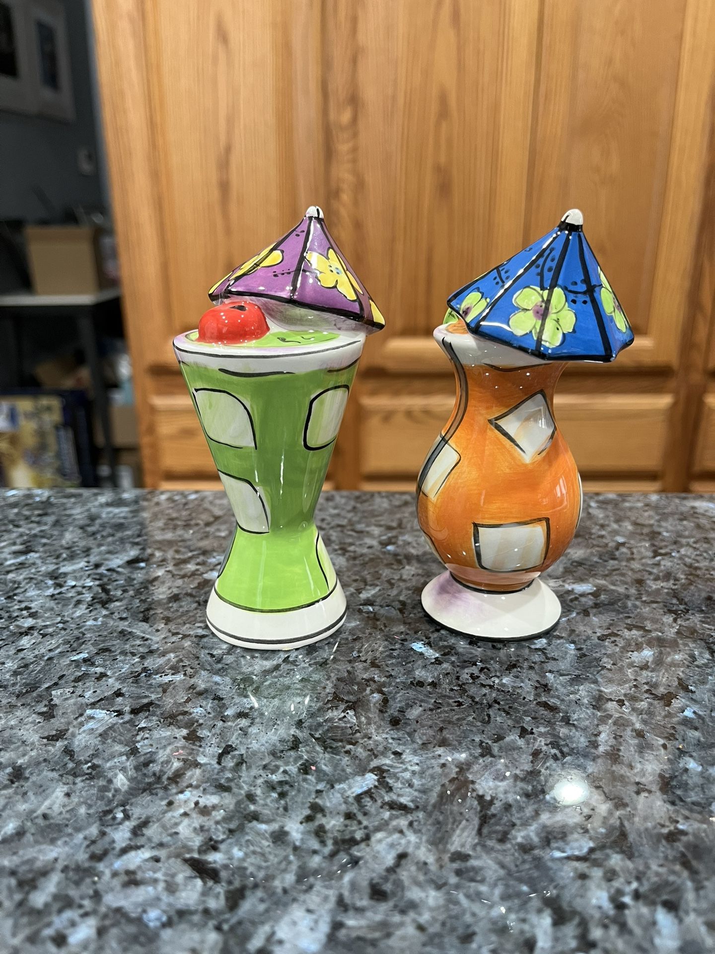 Ceramic Clay Art Cocktail Pair of Salt and Pepper Shakers. Brand new never used with stickers on the bottom.