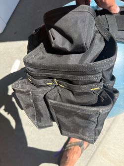 Klein Tools Tradesman Pro tool belt and multi-pocket pouch.